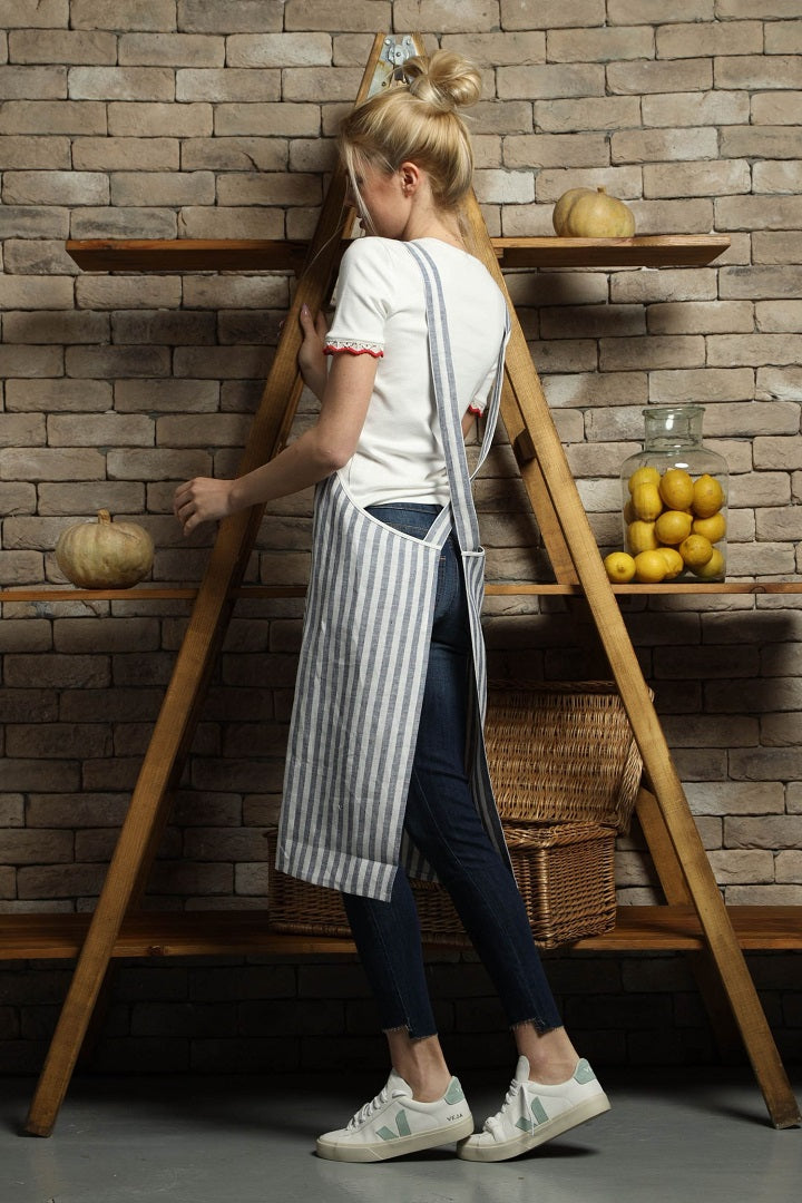 Cross-back linen apron in white and blue stripe