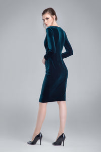 Velvet dress with v-neckline and draped detail in emerald green