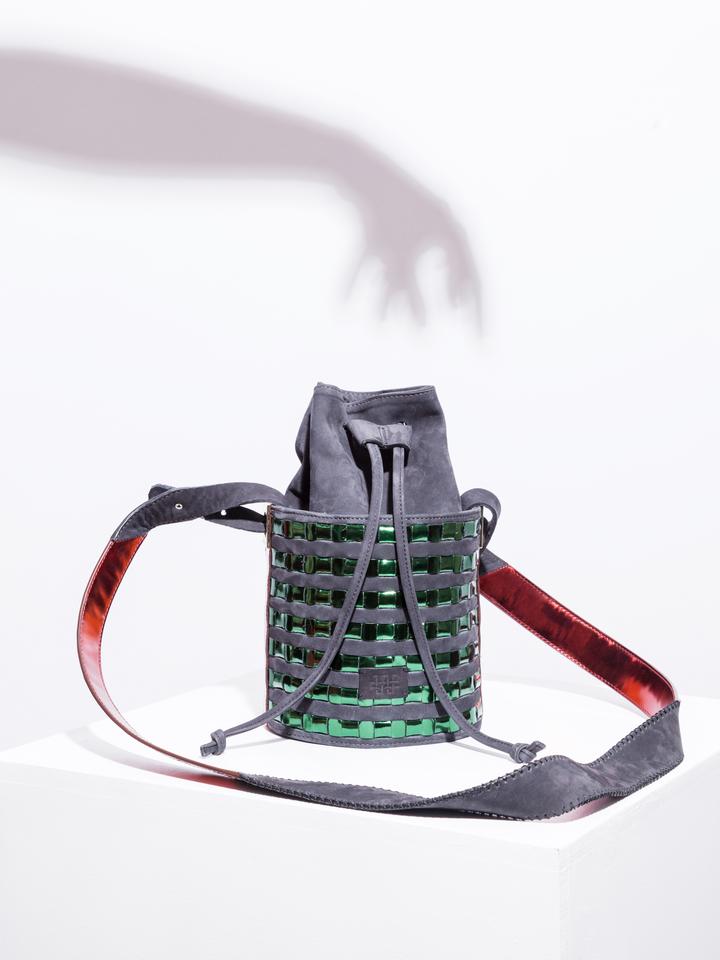 Mini circular bucket bag in black with striped green mirror effect