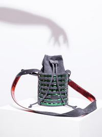Mini circular bucket bag in black with striped green mirror effect