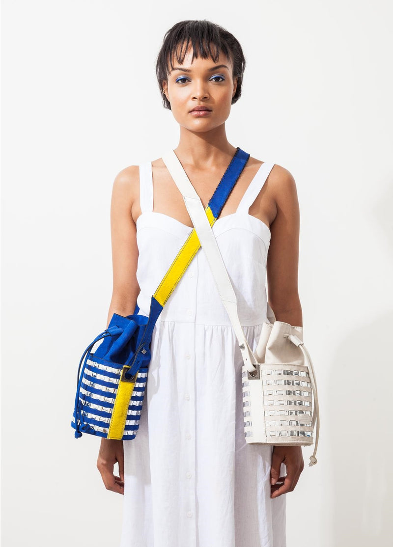 Mini circular bucket bag in royal blue with striped silver mirror effect