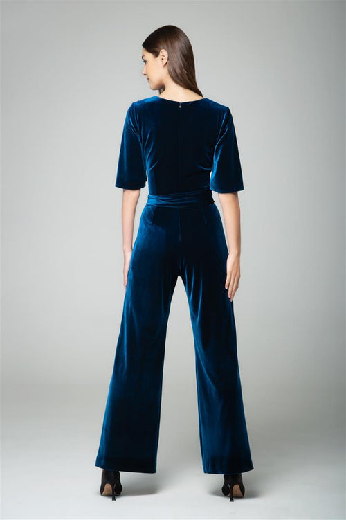 Velvet jumpsuit with bell sleeves and sash in royal blue