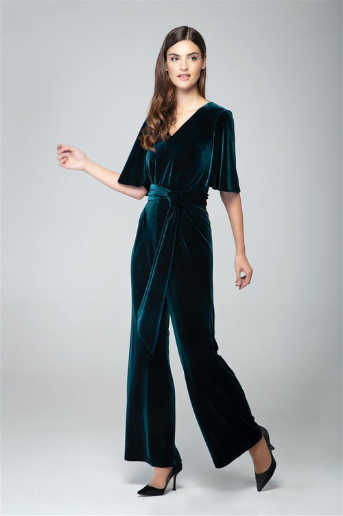 Velvet jumpsuit with bell sleeves and sash in emerald green