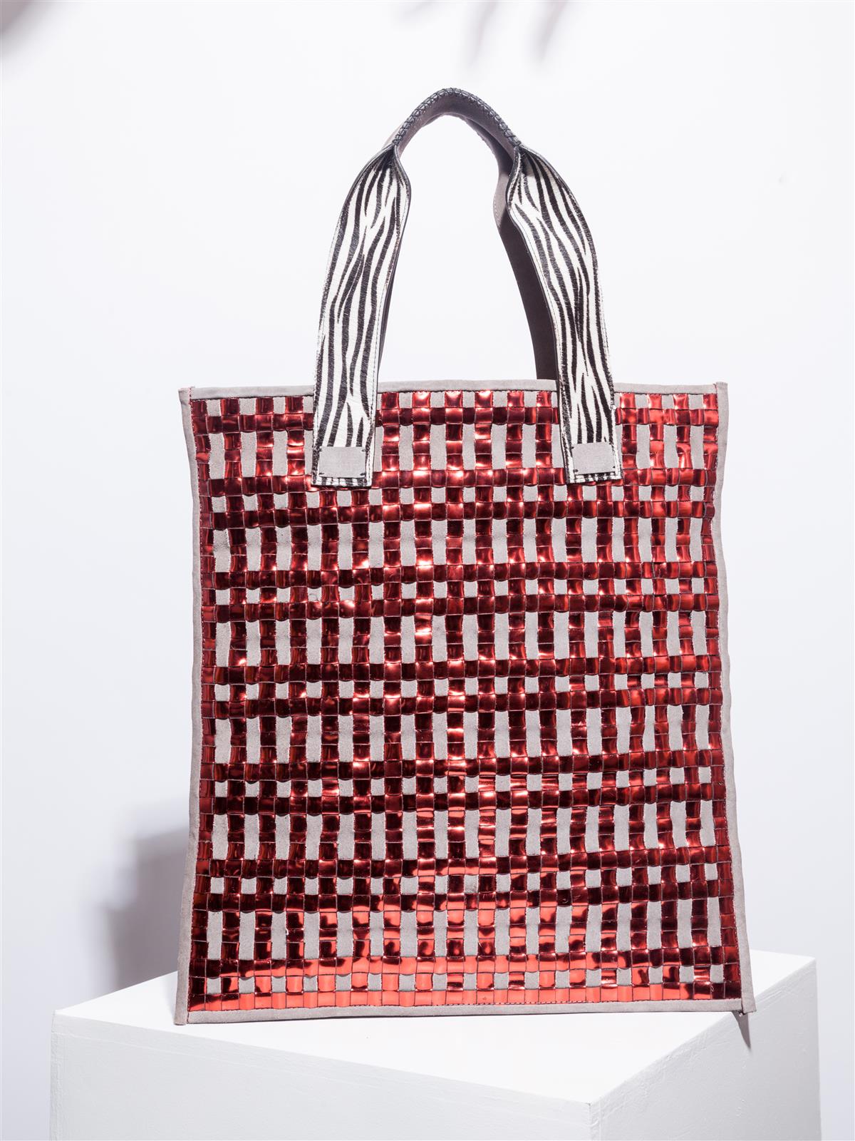 Stardust and mirror red tote with zebra details