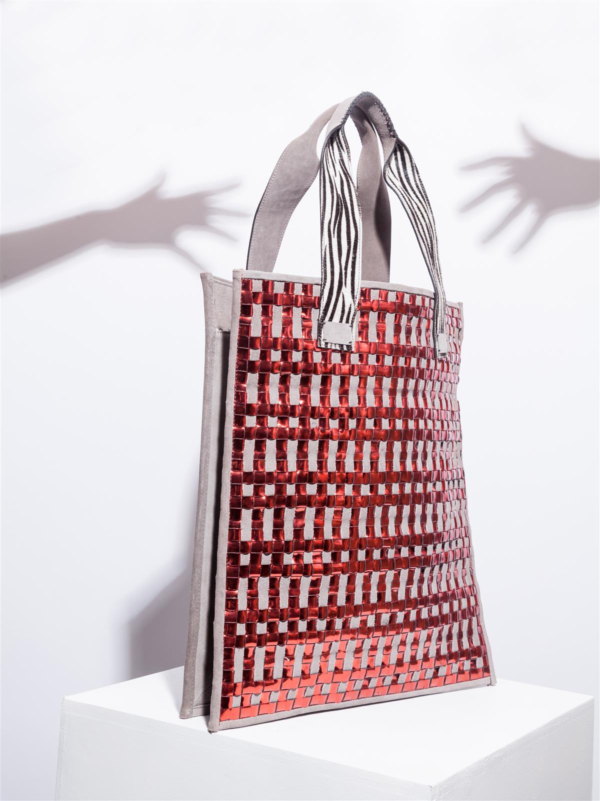 Stardust and mirror red tote with zebra details