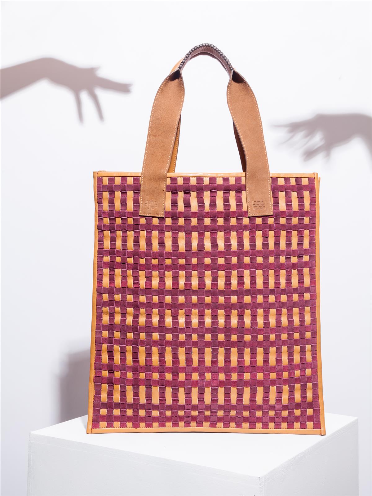 Tan and burgundy tote